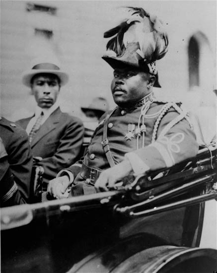 Marcus Garvey in a military uniform as the "Provisional President of Africa" during a parade for the annual Convention of the Negro Peoples of the World.