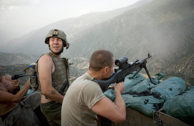 Soldiers shoot at enemy forces across the valley.