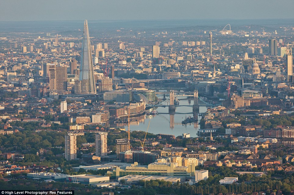 The Aerial View of the London skyline shows that the tallest building in the European Union, The Shard, dominates the landscape of the city. In the background, the BT tower and Wembley Stadium can also be made out